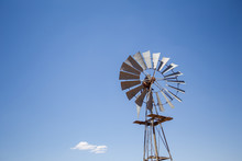 Wide Amgle View Of A Lone Windpomp / Windmill On The Plains Of T