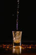 sparkling beverage into shot glass