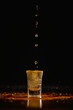 sparkling beverage into shot glass