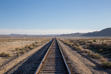 Railroad Tracks In The Desert