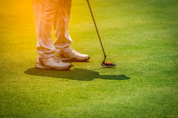 Golf course for golfer concept, golf ball on green for player playing and putting in hole on green course, blurred background for creative graphic design