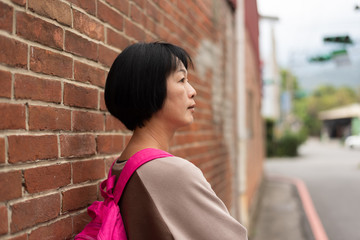 Sticker - Asian traveling woman with bag