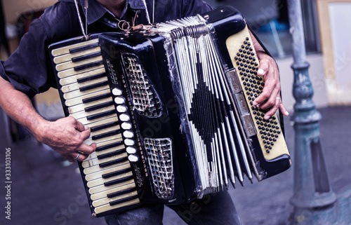 Fotomural musician playing accordion music on street show performance