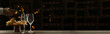© Pixel-Shot - Waiter pouring delicious wine into glass from bottle on table with space for text