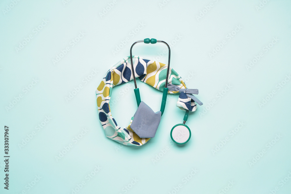 Stethoscope with cover on color background