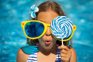 Canvas Print - Happy child having fun on summer vacation