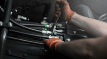 Banner With Close Up View Of Hydraulic Pipes Of Heavy Industry Machine. Low Key.
