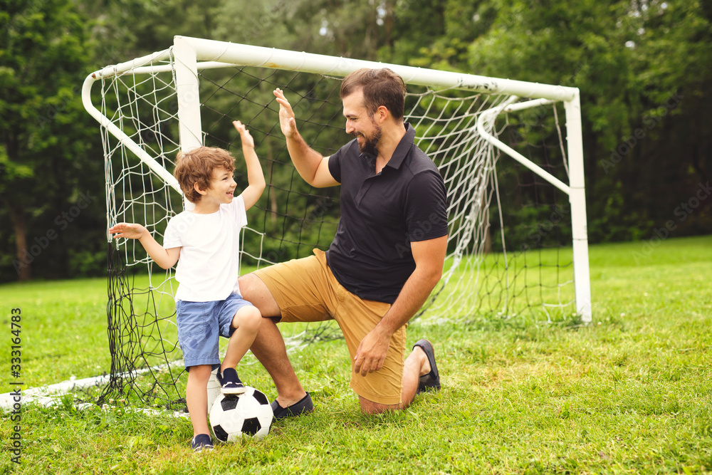 Image of family, father and son playing ball in the park Stock Photo ...