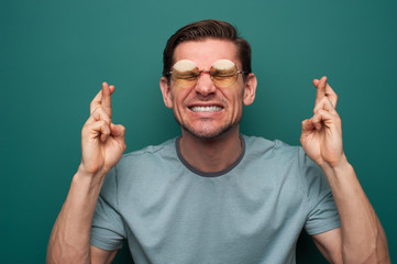 Portrait of a tense young man with glasses