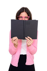 Wall Mural - Studio shot of happy woman hiding behind book isolated against white background