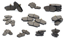 Set Of Brake Pads Isolated On White Baclkground .