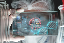 Portrait Of Futuristic Researcher Is Using Futuristic Screen With Augmented Reality Coronavirus Hologram For Viewing Results Of Research In Laboratory.Concept Of Future, Science, Coronavirus, Pandemia