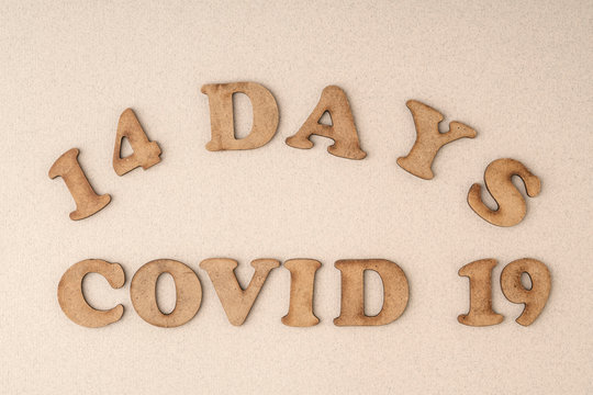 Epidemic corona virus covid 19 written with wooden letters