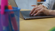 © Fractal Pictures - Beauty female hands typing busy on laptop keyboard on office desk. Close-up of young business woman working on portable computer in workspace.