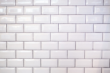  A background of white modern subway tile.