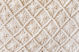Fototapeta Boho - Close-up of hand made macrame texture pattern. ECO friendly modern knitting DIY natural decoration concept. Flat lay.