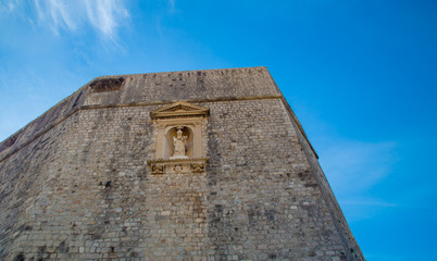 Wall Mural - religious figure on a building