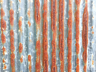 Wall Mural - Rust on Galvanized corrugated sheet, rustic background, weathered background. Metal sheet with rusty.