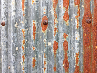 Wall Mural - Rust on Galvanized corrugated sheet, rustic background, weathered background. Metal sheet with rusty.