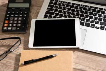 Fototapete - Mockup of business man using communication laptop screen for your advertising text message coffee on table copy space.