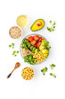 Healthy salad bowl with quinoa, avocado and chickpeas on white background top-down