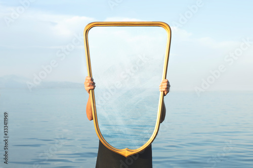 Fotomural surreal image of a transparent mirror; concept of door to freedom