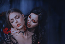 Close Up Artwork Portrait Face Sexy Vampire Woman Bites Eating Drinks Young Princess. Makeup Drop Blood. Bloody Wounds Bite On Neck Blonde Girl. Horror Night Halloween. Holiday Scary Make-up Red Lips 