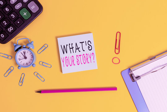 Handwriting text writing Whats Is Your Storyquestion. Conceptual photo manner of asking demonstrating about past events Alarm clipboard calculator clips band pencil notepad colored background