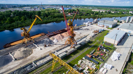 cranes in docks and sand