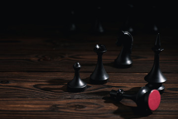 Wall Mural - selective focus of chess figures on wooden surface