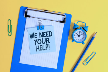 Conceptual hand writing showing We Need Your Help. Concept meaning asking someone to stand with you against difficulty Clipboard sheet note pencil clips alarm clock colored background