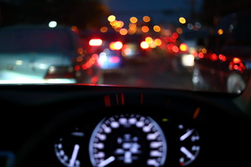 Wall Mural - light of traffic jam on night street, image blur urban road background