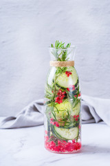 Wall Mural - Fresh cool cucumber pomegranate infused water detox drink