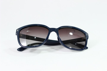 stylish sunglasses with a blue frame on a white background