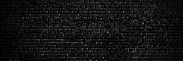Wall Mural - texture of a black brick wall as a background or wallpaper