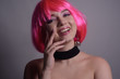 © MoreThanProd - A bright girl with bright pink hair rejoices, goes crazy, has fun, grimaces. Positive energy. Summer mood. The girl smiles and laughs sincerely, an informal beauty. Black dress.