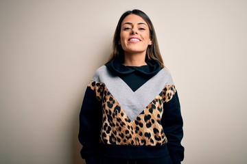 Sticker - Young beautiful woman wearing casual sweatshirt standing over isolated white background with a happy and cool smile on face. Lucky person.