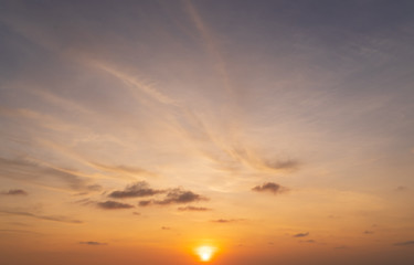 Wall Mural - abstract amazing scene of stuning colorful sunset with moving clouds background in nature and travel