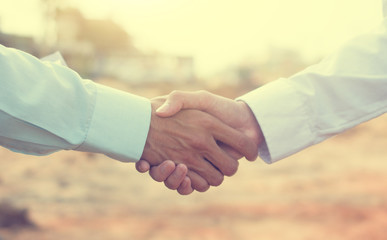 Close up people hands shake business partnership success,Shake hand concept