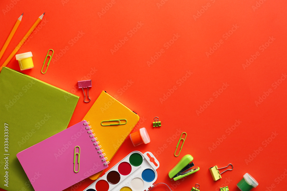 Set of school supplies on color background