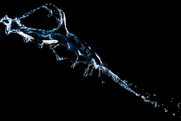 Splash of clean water on dark background