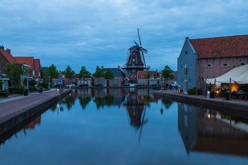 Water canal in Meppel, Holland at sunrise. The background is the sky with clouds.