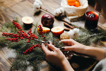 Making Christmas wreath, decorating the house for Christmas.