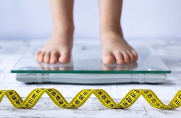 Child measuring weight concept. Close up