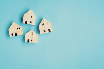 Wall Mural - House wood model concept on blue background and copy space for text