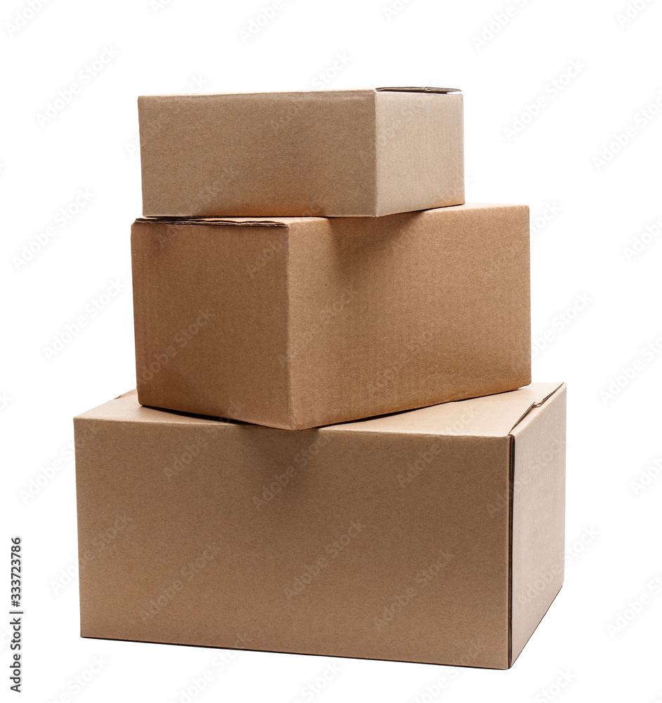 stack of three cardboard boxes of different sizes isolated on white - obrazy, fototapety, plakaty 