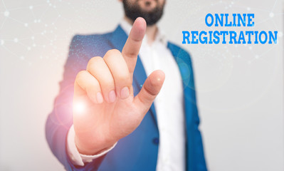 Poster - Writing note showing Online Registration. Business concept for System for subscribing or registering via the Internet Businessman with pointing finger in front of him