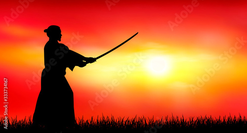 Fotomural Japanese warrior samurai with a sword at sunset