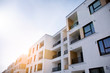 © Grand Warszawski - Modern apartment building flat estate concept. Outdoor residential facility at sunset and sunrise.