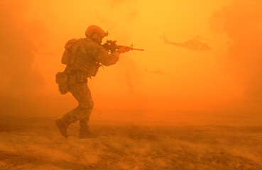 Military troops on the way to the battlefield in desert.